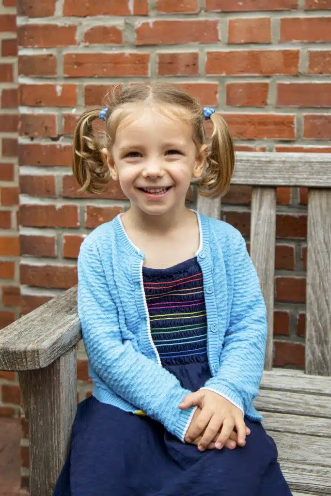 PS girl sitting on bench