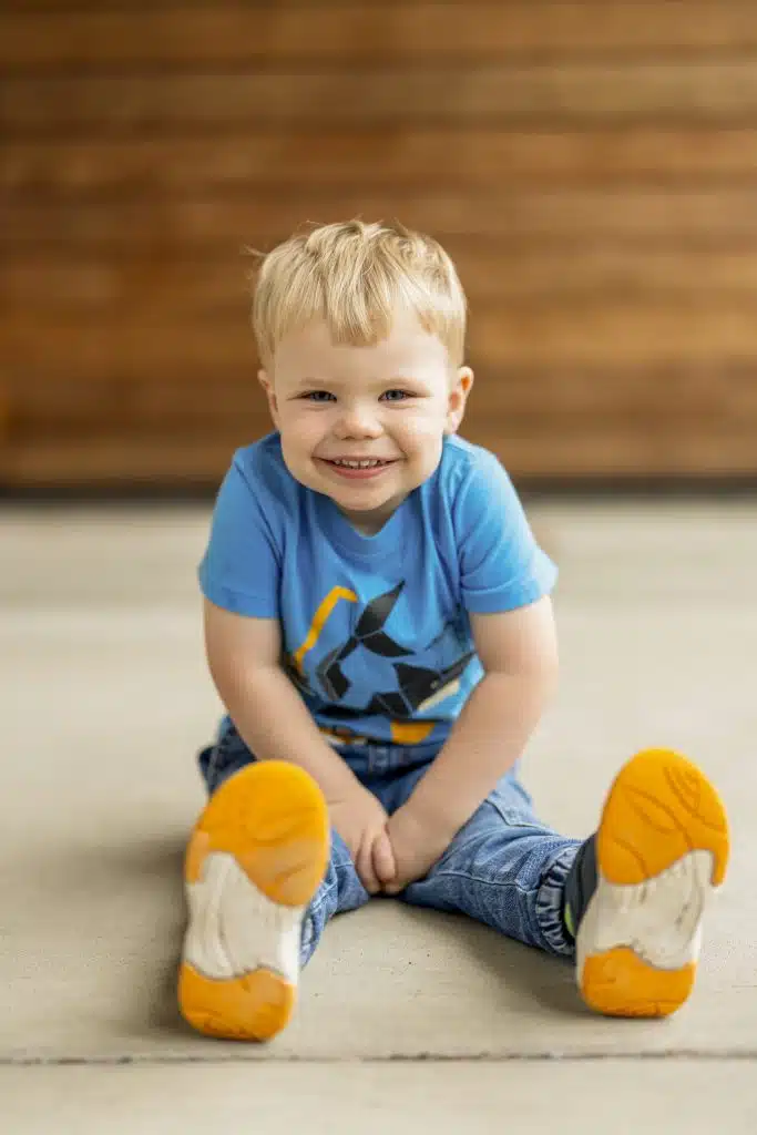 Toddler boy sitting